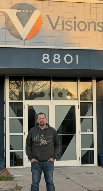 Don Schultz outside the Visions building in Brooklyn Park